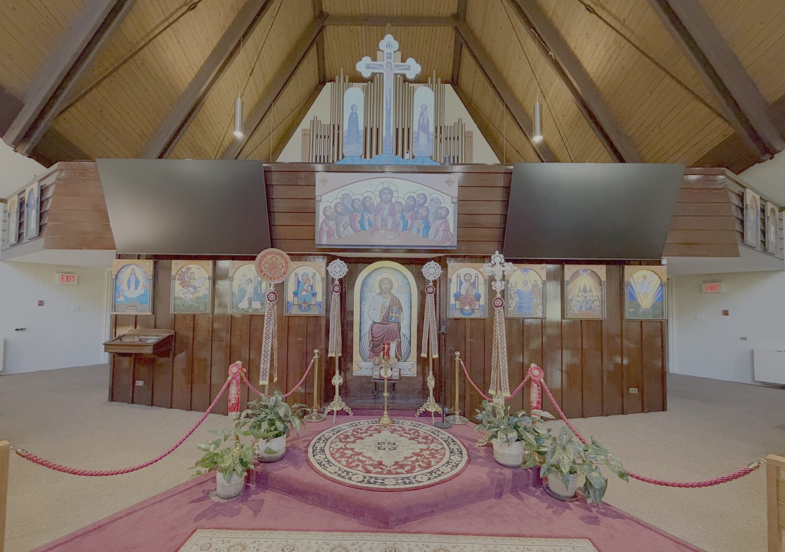The iconostasis, the icon screen in front of the sanctuary, with the icon of Christ enthroned at its center